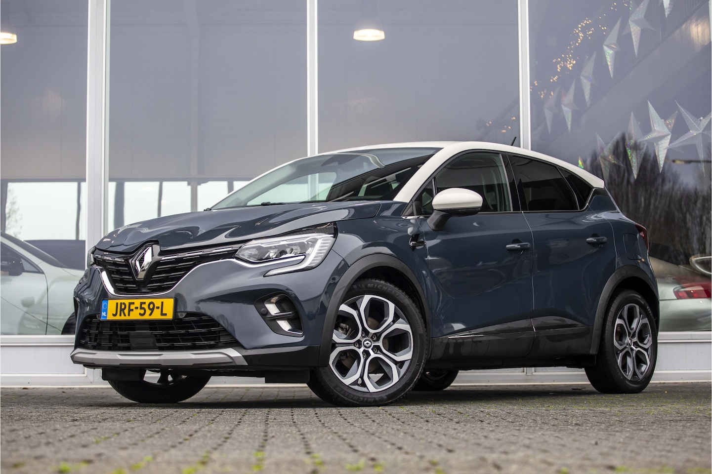 Renault Captur - 1.6 E-Tech Plug-in Hybrid 160 Intens | Camera | 18" | LED - AutoWereld.nl