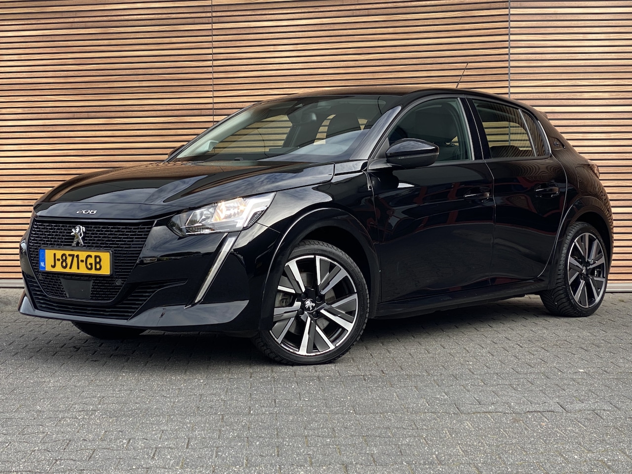 Peugeot e-208 - EV Allure 50 kWh Parkeerhulp / Carplay / Lm-velgen - AutoWereld.nl