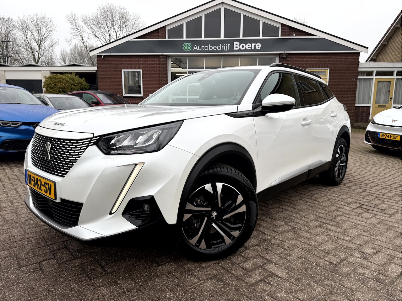 Peugeot e-2008 - EV Allure Pack 50 kWh SOH 91,3%, Camera, Carplay, Stoelverwarming - AutoWereld.nl