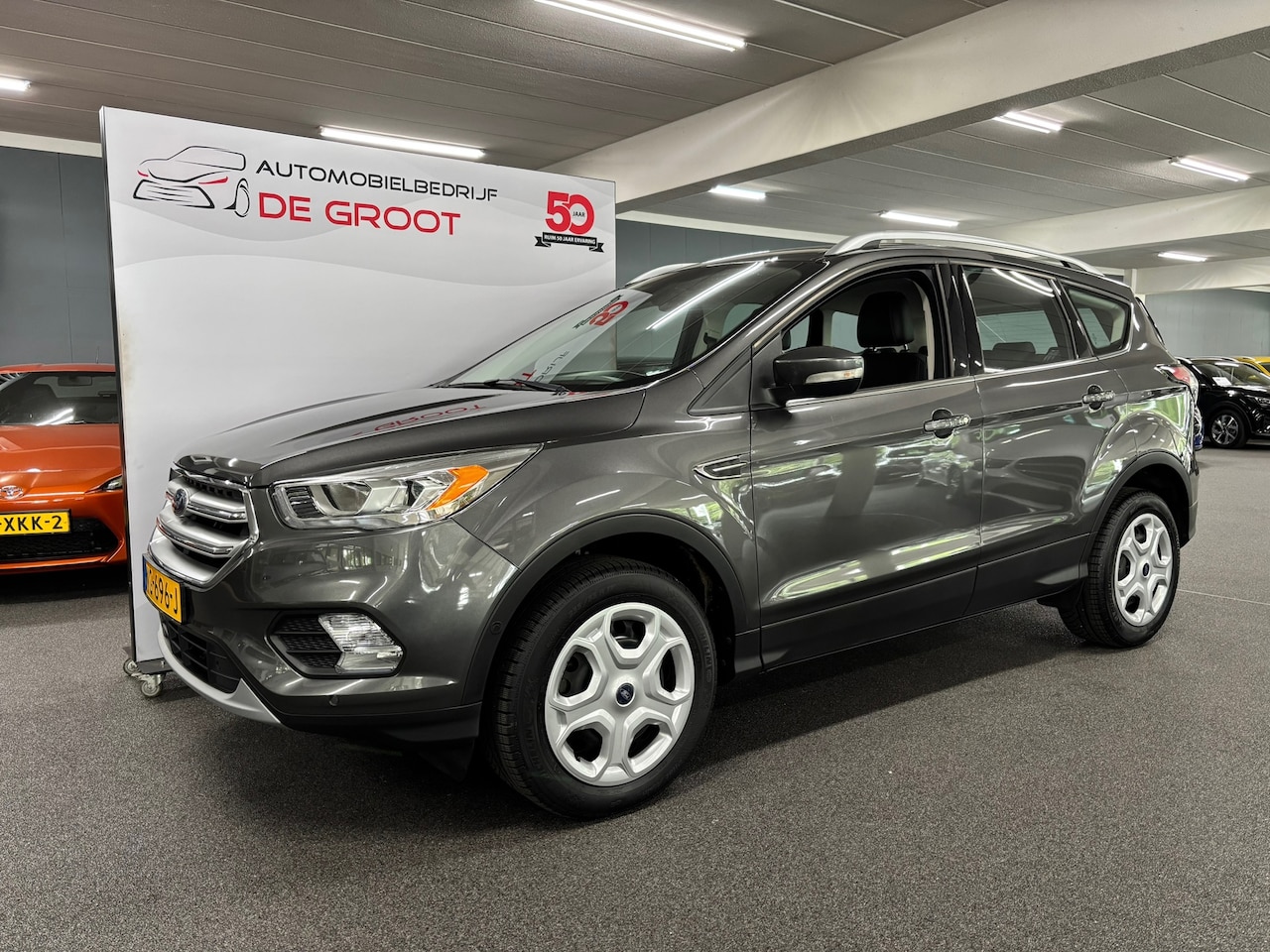 Ford Kuga - 1.5 EcoBoost Titanium / NL-auto, Cruise control, Radio, Navi, Trekhaak - AutoWereld.nl