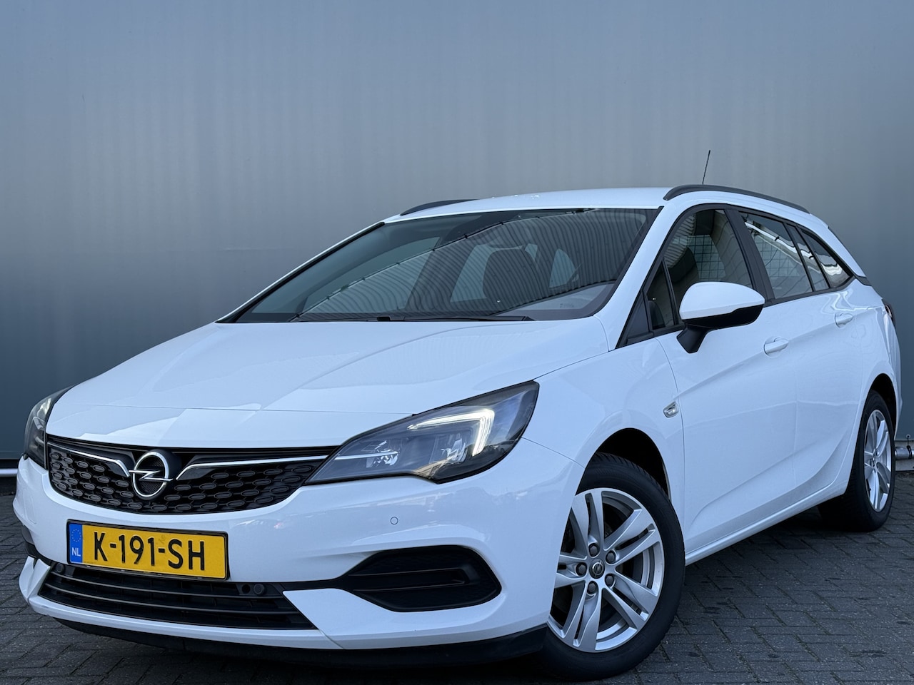 Opel Astra Sports Tourer - BWJ 2021 1.2 111 PK Edition TREKHAAK | LED | AIRCO | CRUISE | BLUETOOTH | ELEK. PAKKET | A - AutoWereld.nl