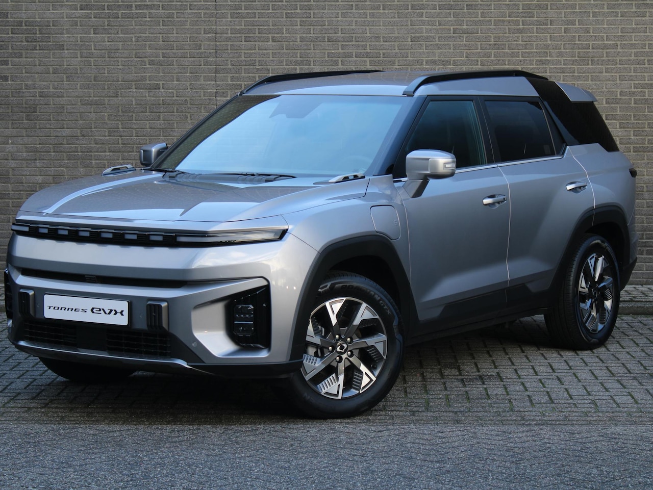 KGM Torres EVX - Platinum 73.4 kWh Lederen bekleding met stoelverwarming / Draadloze telefoonlader / 1500km - AutoWereld.nl