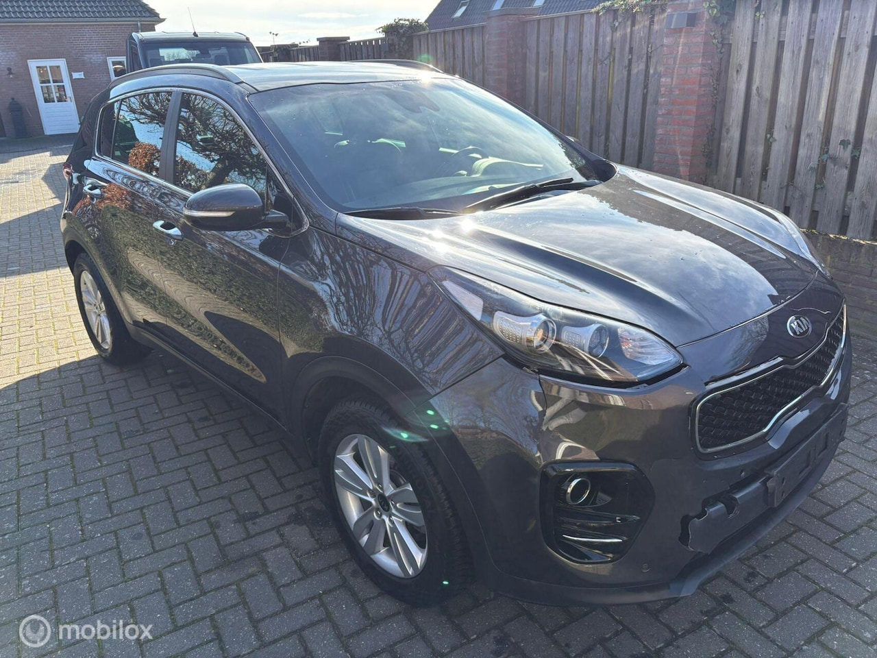 Kia Sportage - 1.6 met lichte voorschade - AutoWereld.nl