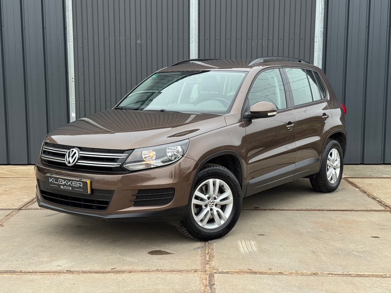 Volkswagen Tiguan - 1.4 TSI Comfort&Design 1E EIG|Airco|Clima|Cruise|Navi - AutoWereld.nl