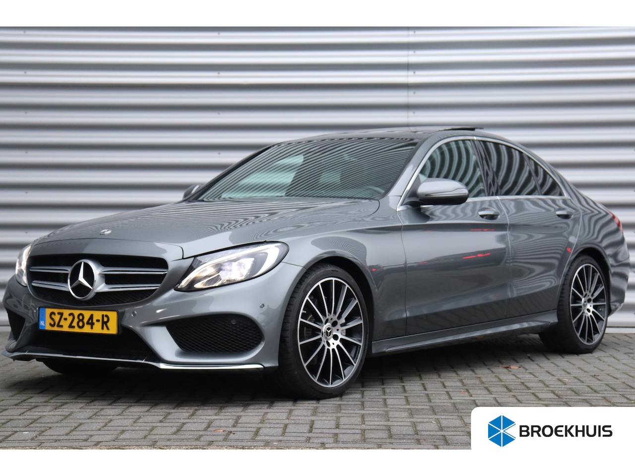 Mercedes-Benz C-klasse - C180 156PK AMG LINE PREMIUM PLUS UPGRADE AUTOMAAT / NAVI / LEDER / CLIMA / FULL-LED / PDC - AutoWereld.nl