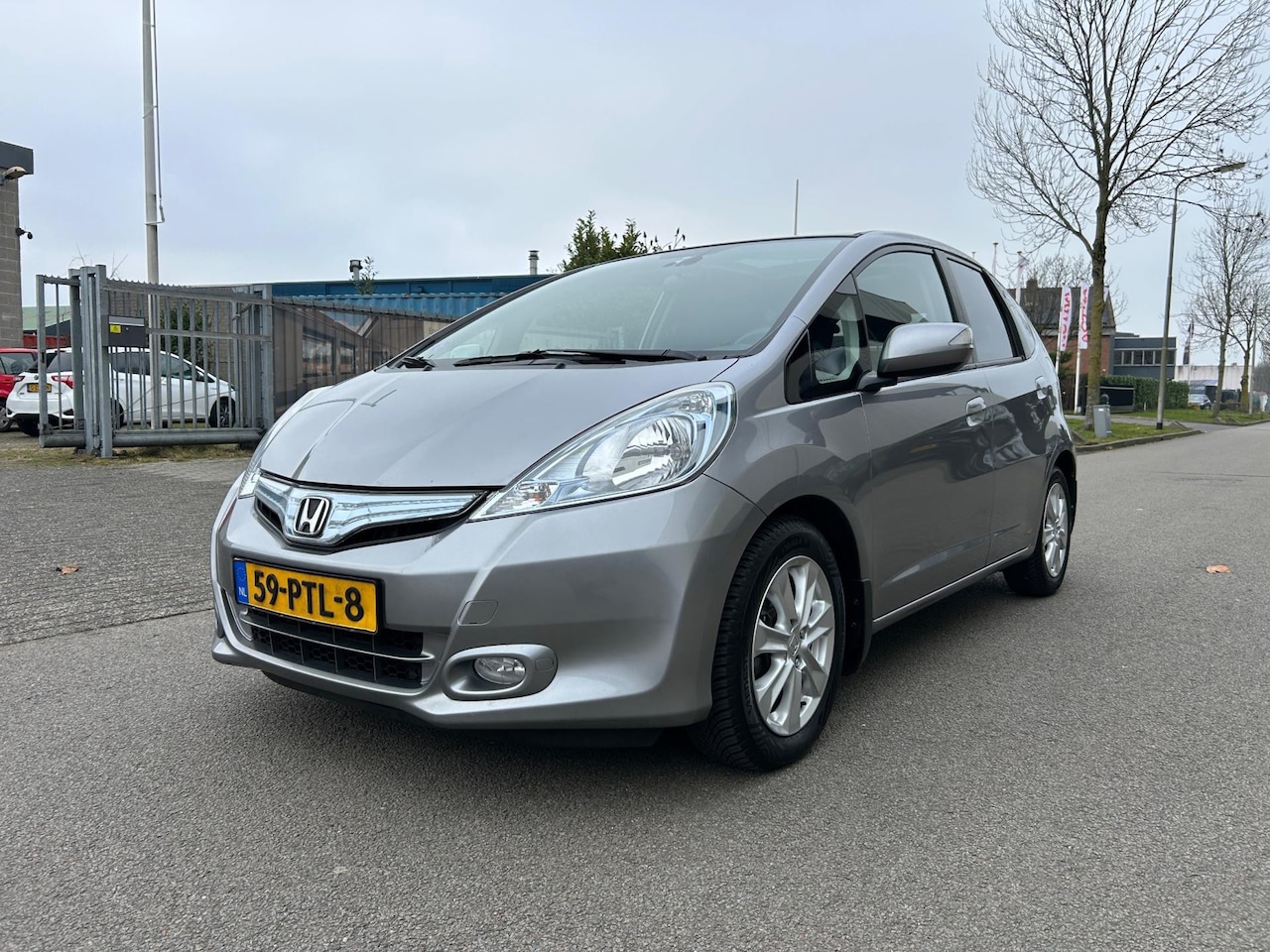 Honda Jazz - 1.4 Hybrid Exclusive Pano/Stoelverwarming/Leder/Clima/Cruise - AutoWereld.nl