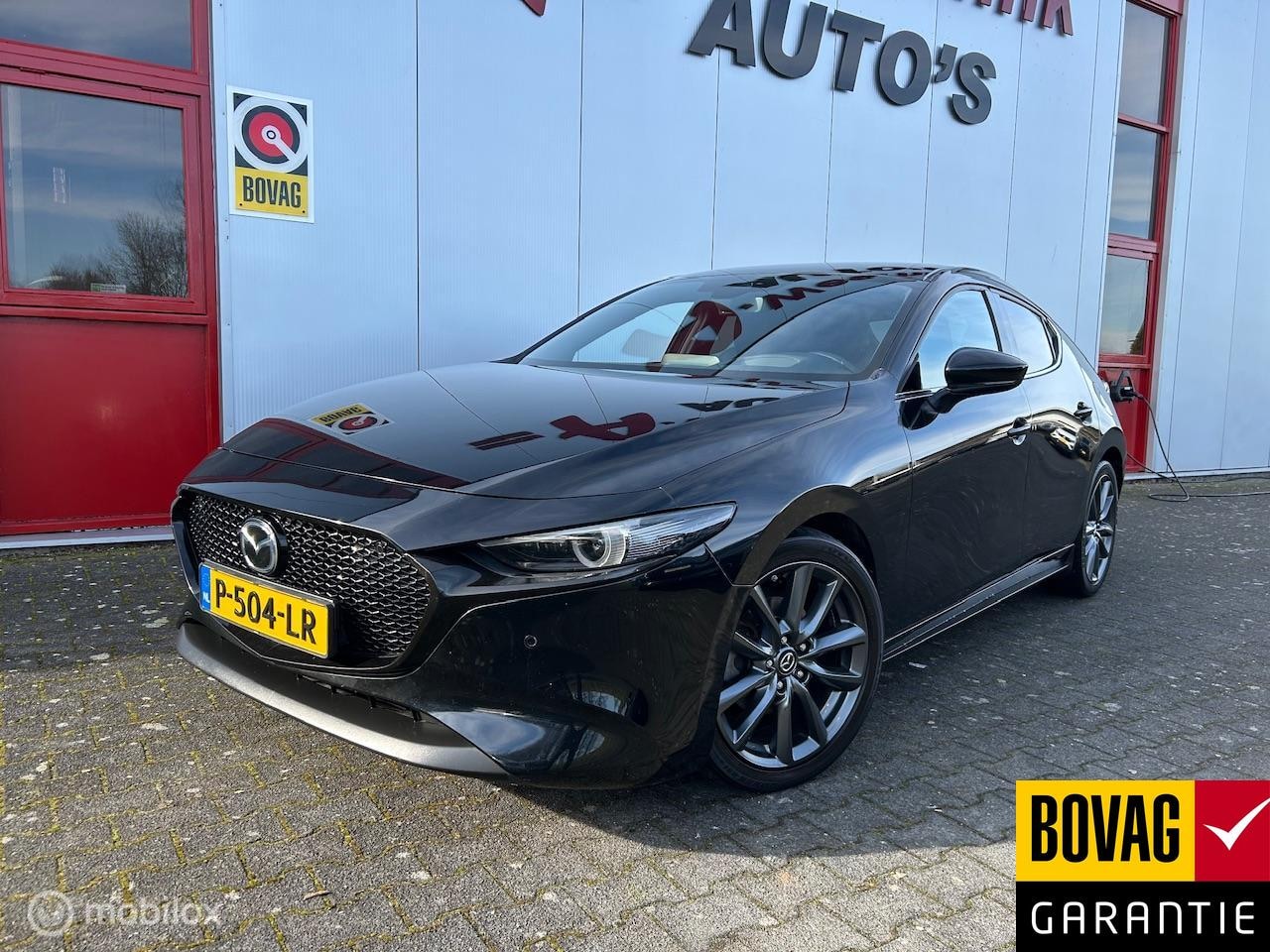 Mazda 3 - 2.0 SkyActiv-G 165 GT-M Hybrid 360 camera - AutoWereld.nl