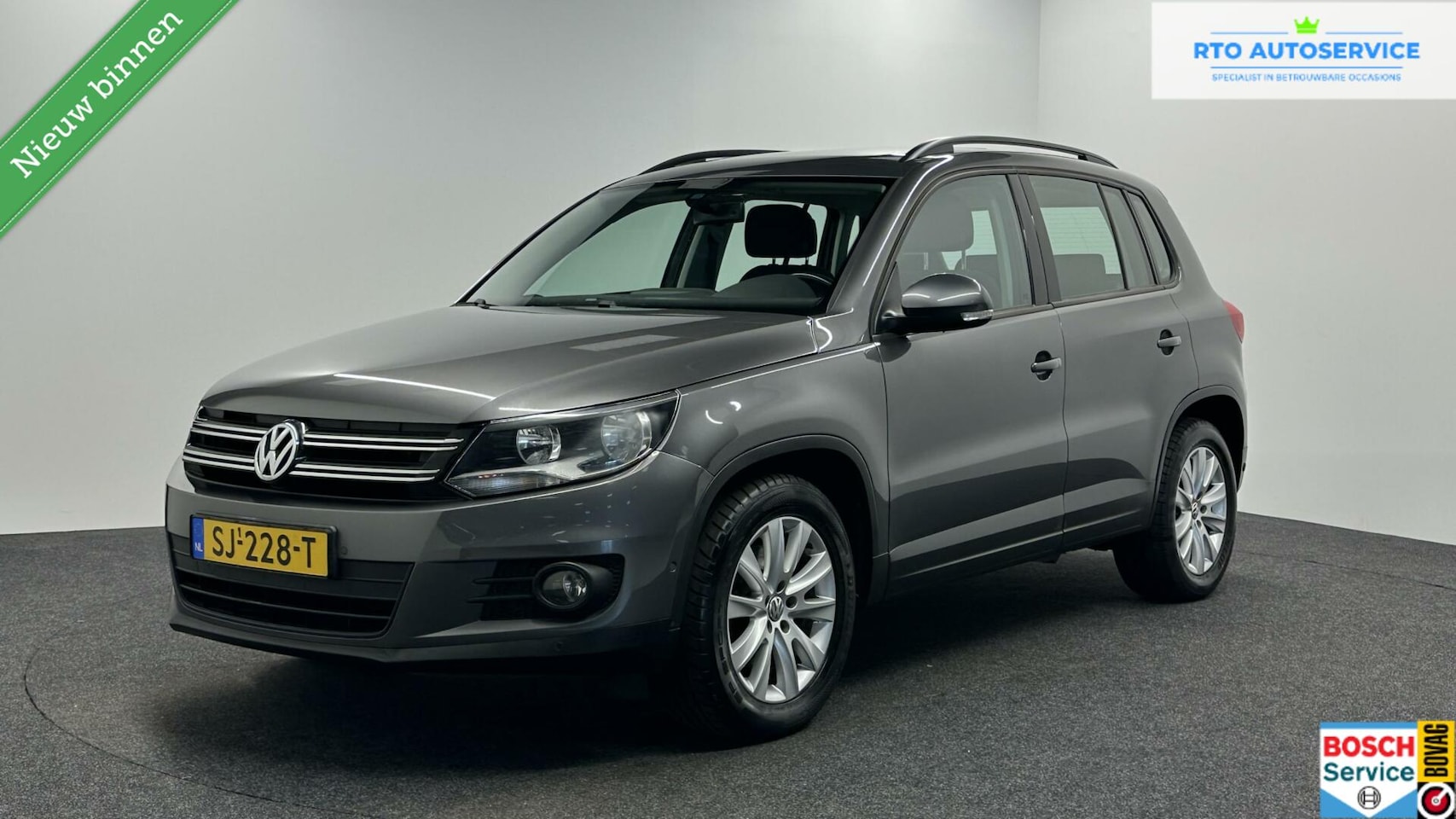 Volkswagen Tiguan - 1.4 TSI Comfortline CRUISE-PANORAMADAK-CLIMATE CONTROL - AutoWereld.nl
