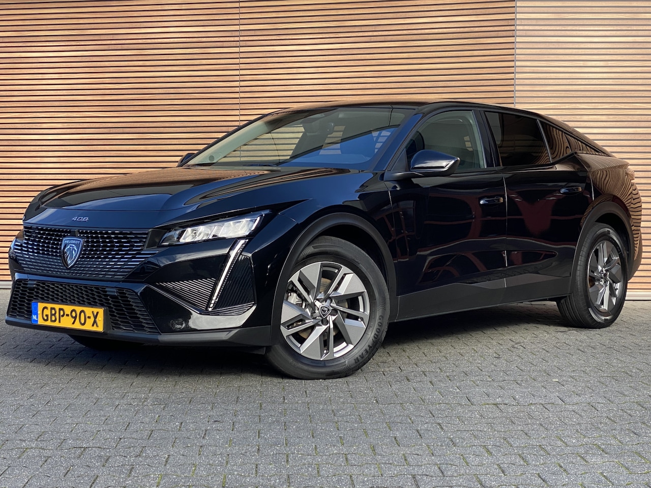 Peugeot 408 - 1.2 Hybrid 136 e-DCS6 Allure Camera / Navigatie / Cruise - AutoWereld.nl