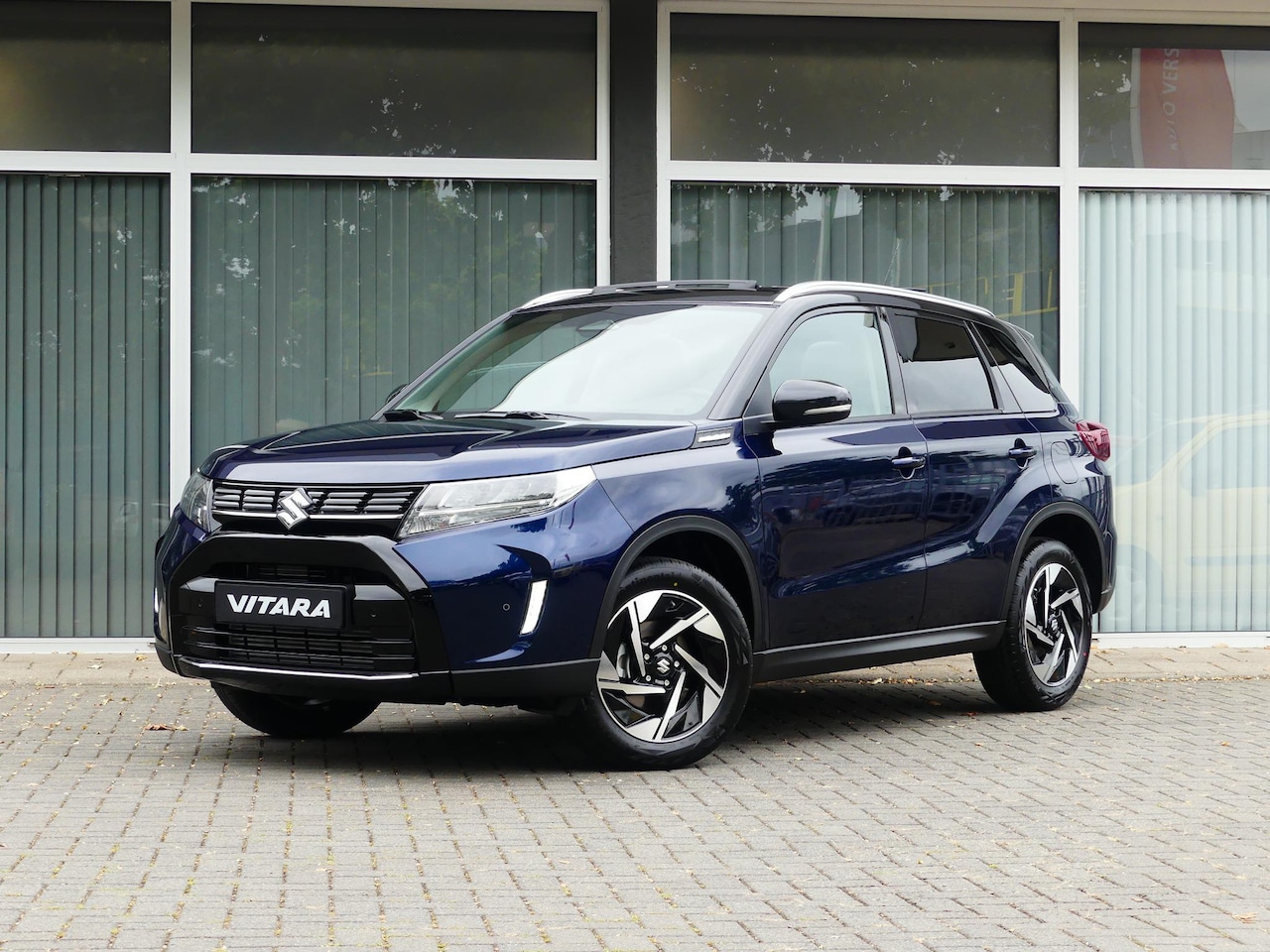 Suzuki Vitara - 1.4 Boosterjet Style Smart Hybrid PANORAMADAK, 6 jaar fabrieksgarantie! Nieuw uit voorraad - AutoWereld.nl