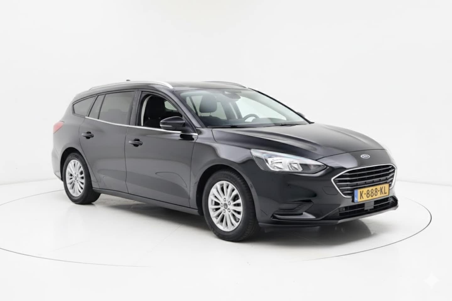 Ford Focus Wagon - 1.0 EcoB. Titanium | Geen import | Trekhaak I Navi | Cruise | - AutoWereld.nl