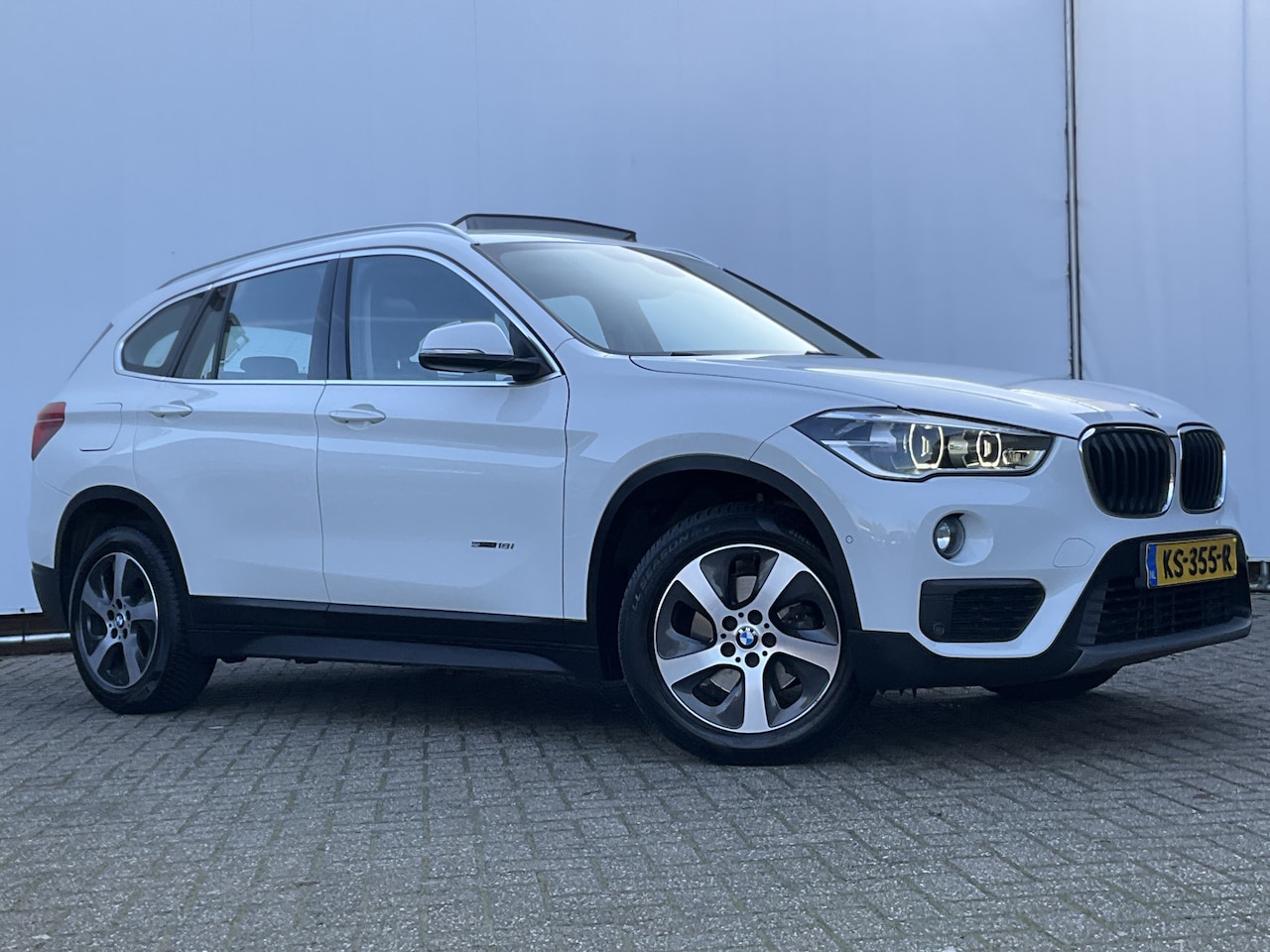 BMW X1 - 18i Autom. High Executive LeerSport Panodak Trekhaak(1700kg) - AutoWereld.nl