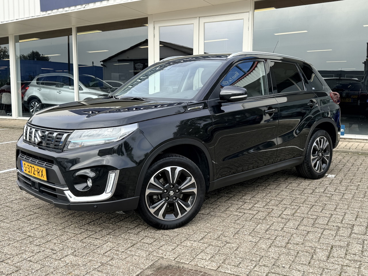 Suzuki Vitara - 1.5 Hybrid Style | Pano | Adapt. Cruise | Alcantara-Leder | Apple CarPlay | Stoelverwarmin - AutoWereld.nl