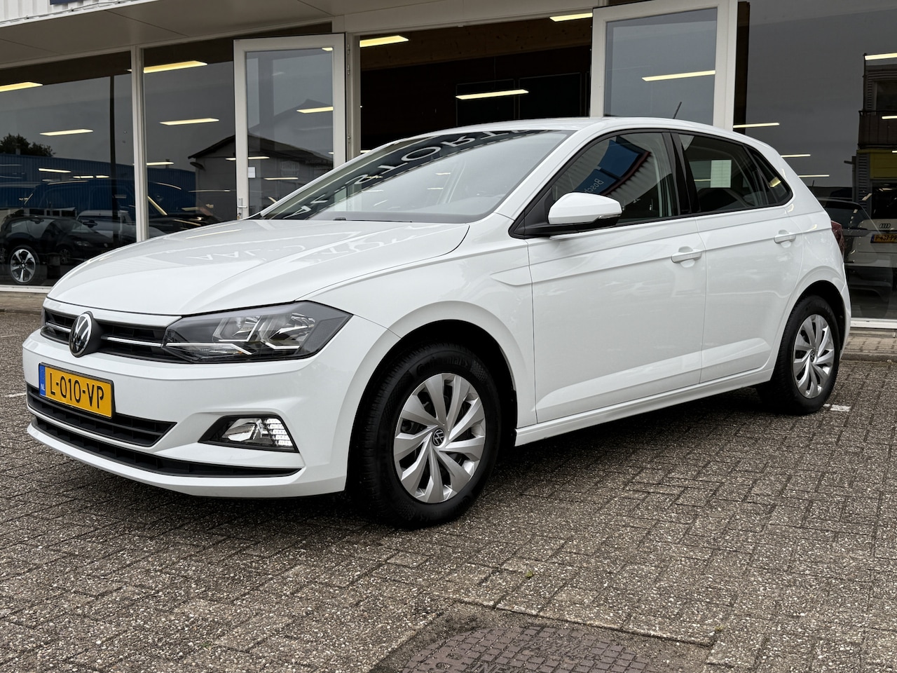 Volkswagen Polo - 1.0 TSI Comfortline | Automaat | Airco | Adapt. Cruise | Apple Carplay | DAB | Navi - AutoWereld.nl