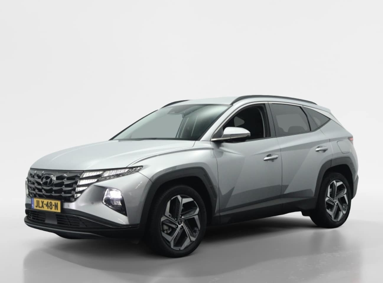 Hyundai Tucson - 1.6 T-GDI HEV Comfort Smart | Navigatie | Camera | Stoelverwarmi - AutoWereld.nl