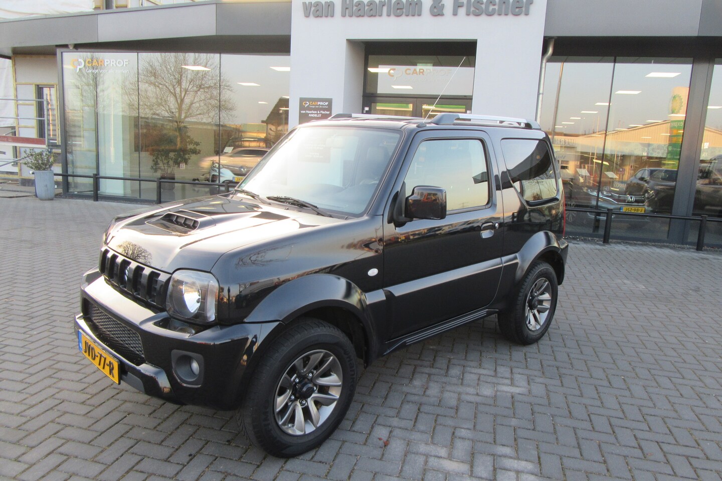 Suzuki Jimny - 1.3 Rhino 4x4, Airco, Leder, Stoelverw. - AutoWereld.nl
