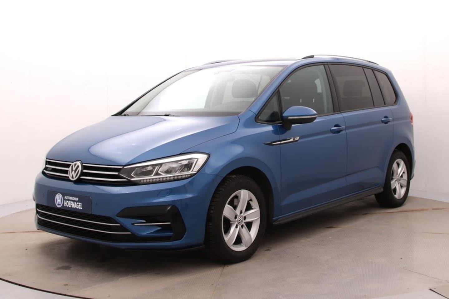 Volkswagen Touran - 1.5 TSI Highline Business R 7p | Automaat | Adaptive cruise | Stoelverwarming | CarPlay | - AutoWereld.nl