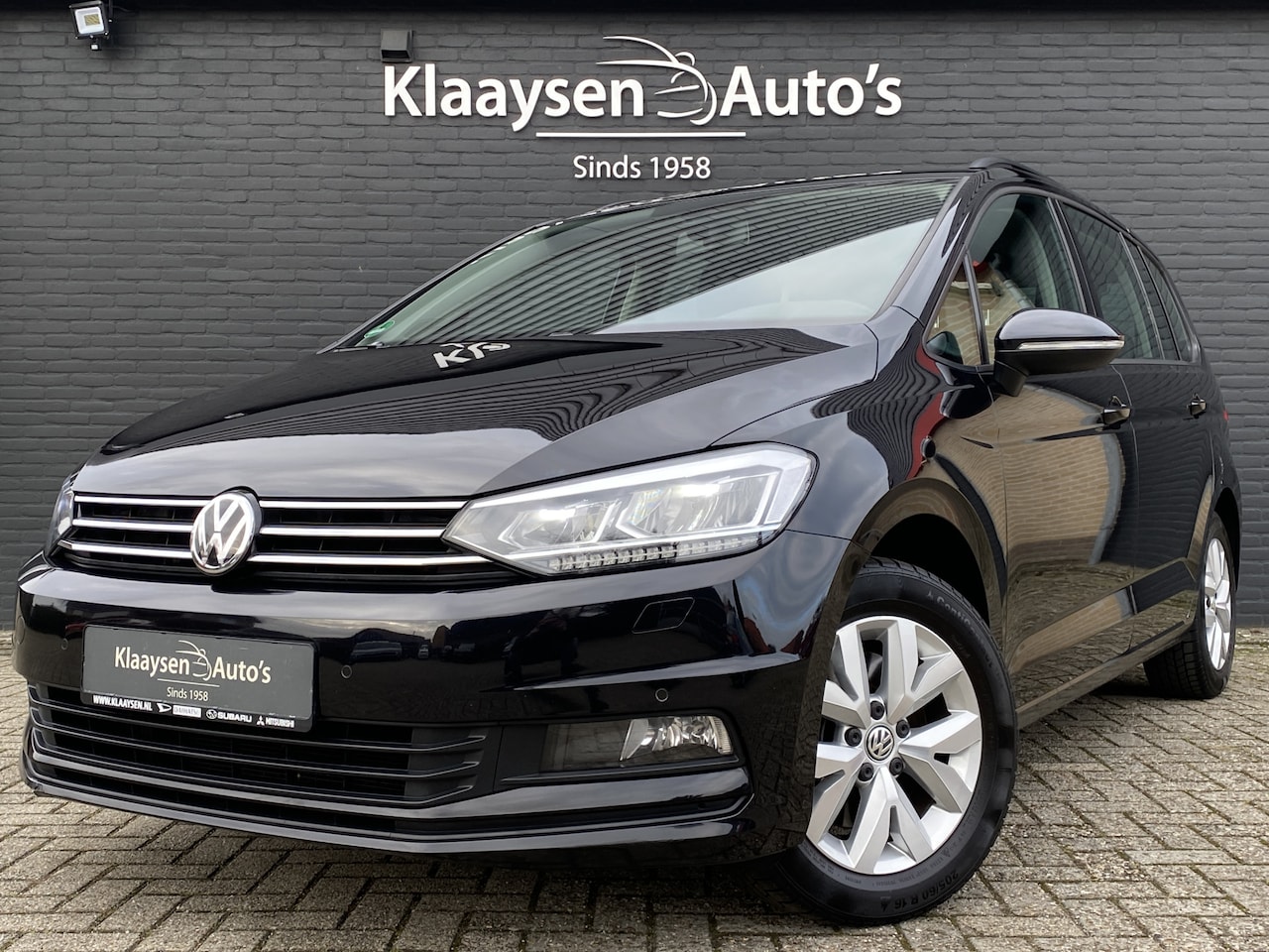 Volkswagen Touran - 1.4 TSI Comfortline 150 pk AUT. | 7 persoons | navigatie | apple carplay | adapt. cruise | - AutoWereld.nl