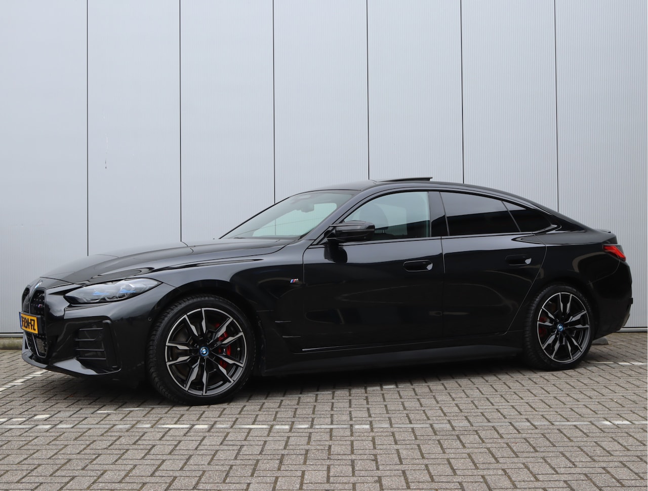 BMW i4 - M50 84 kWh | H&K | Pano | Trekhaak | Leder | Head-Up | 95% SOH - AutoWereld.nl