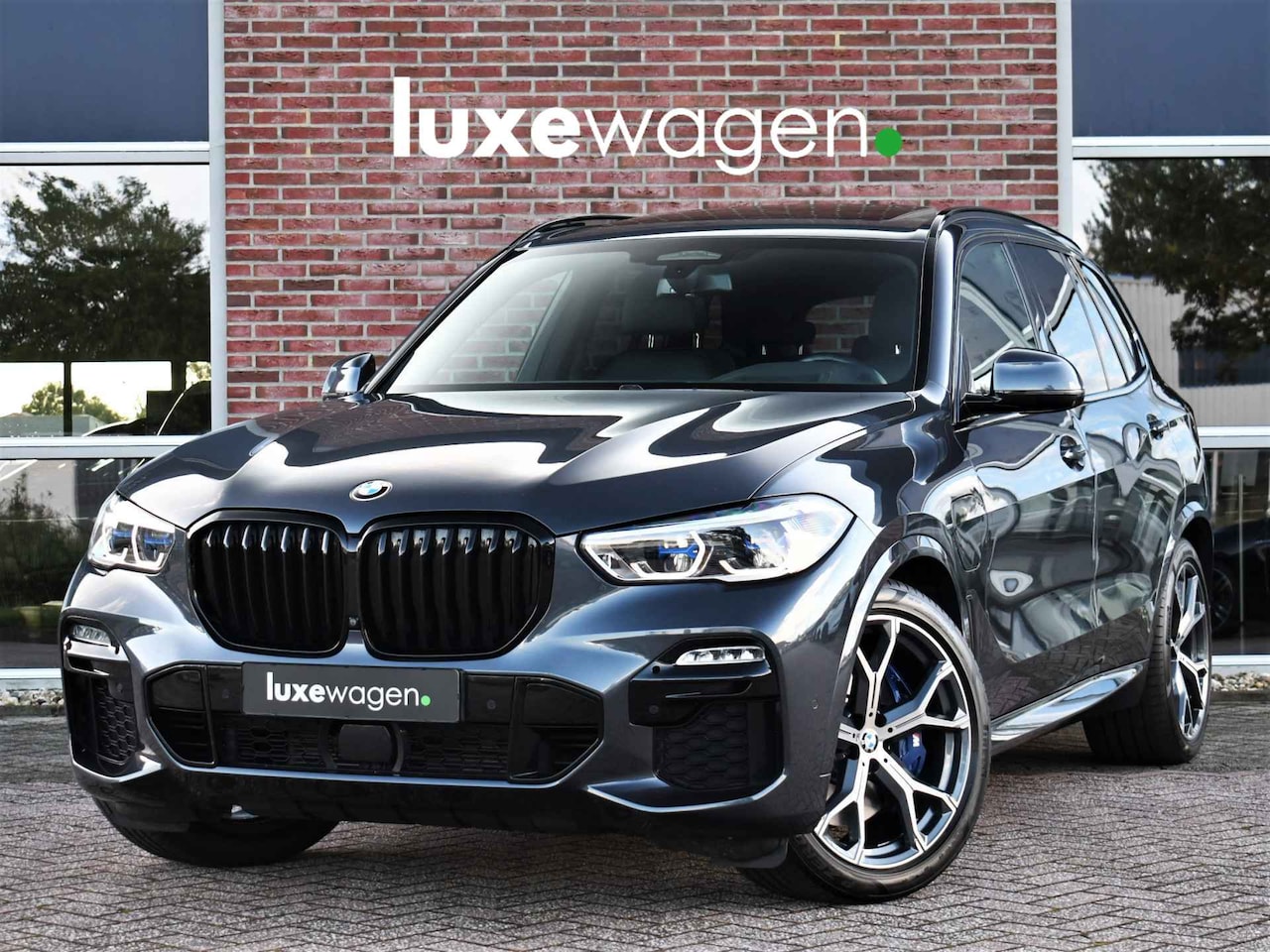 BMW X5 - xDrive45e 394pk M-Sport Pano Trekh HUD ACC 360 Laser - AutoWereld.nl