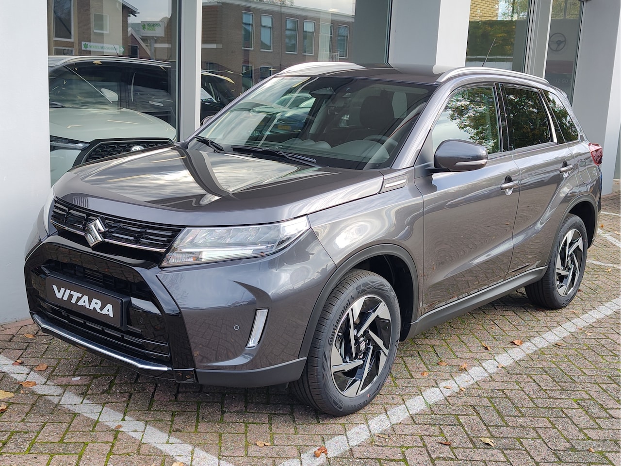 Suzuki Vitara - 1.4 BOOSTERJET STYLE SMART HYBRID AUTOMAAT | DEMO DEAL! | Garantie tot 2035! - AutoWereld.nl