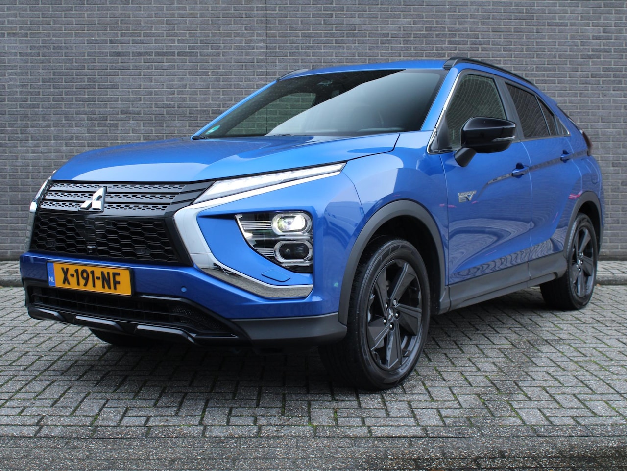 Mitsubishi Eclipse Cross - 2.4 PHEV Black Edition Automaat, Navigatie, Cruise/Climate control, Apple carplay/Android - AutoWereld.nl