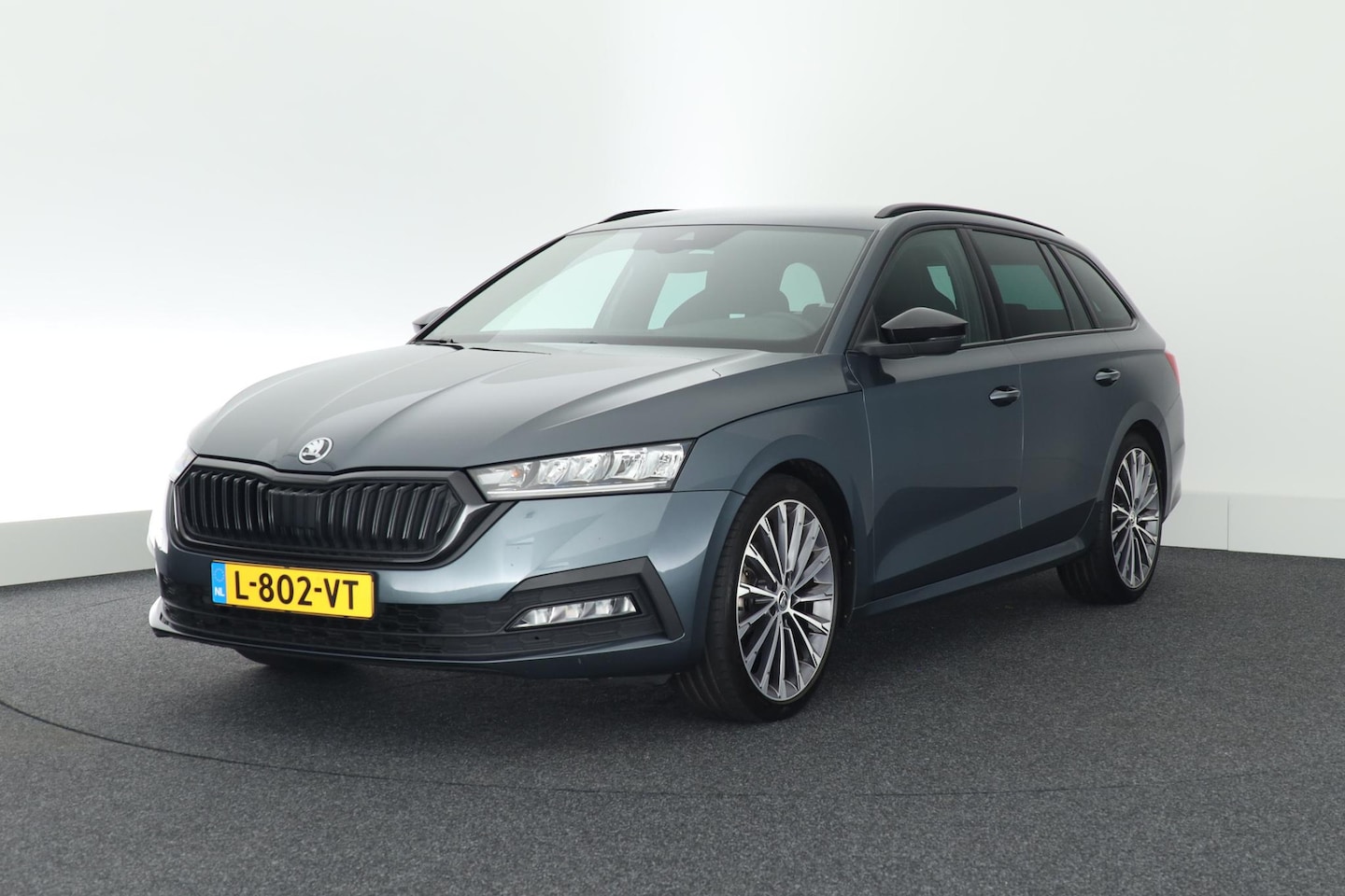 Skoda Octavia Combi - 1.0 TSI 110pk Sport Business Trekhaak Camera ACC Navigatie - AutoWereld.nl