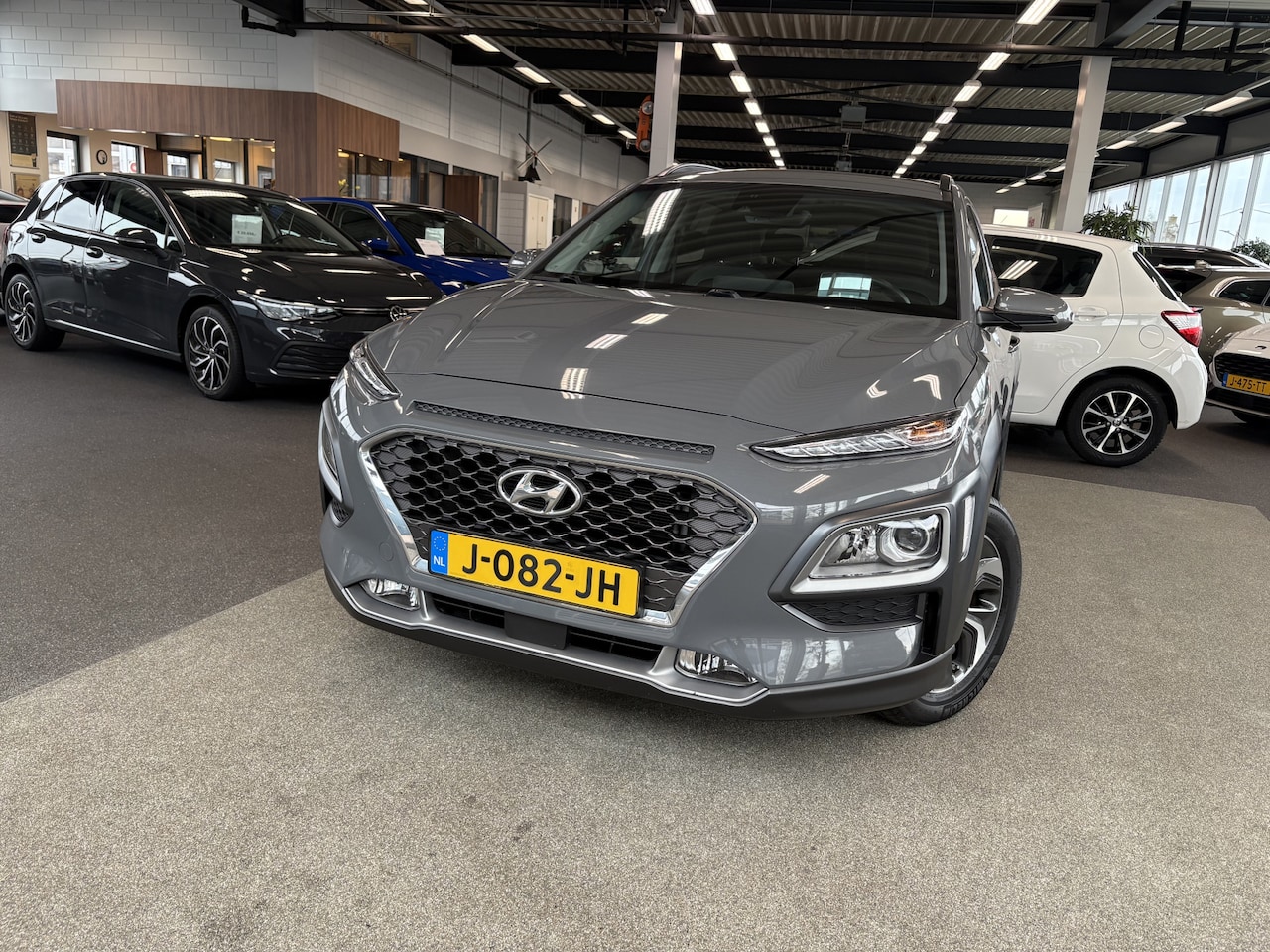 Hyundai Kona - 1.6 GDi HEV Fashion Automaat CAMERA/HUD/DODEHOEK/KEYLESS/NAVI/ADAPT.CRUISE/PDC - AutoWereld.nl