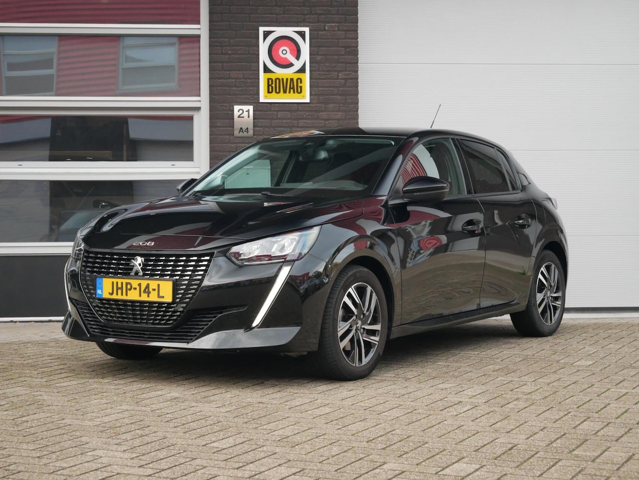Peugeot 208 - 1.2 PureTech Allure Pack Camera| Navi+ BT - AutoWereld.nl