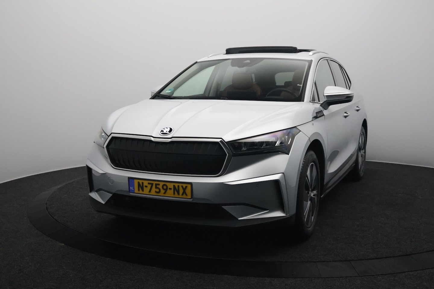 Skoda Enyaq iV - 60 SOH 94% | Warmtepomp | Panoramadak | Camera | Leer - AutoWereld.nl