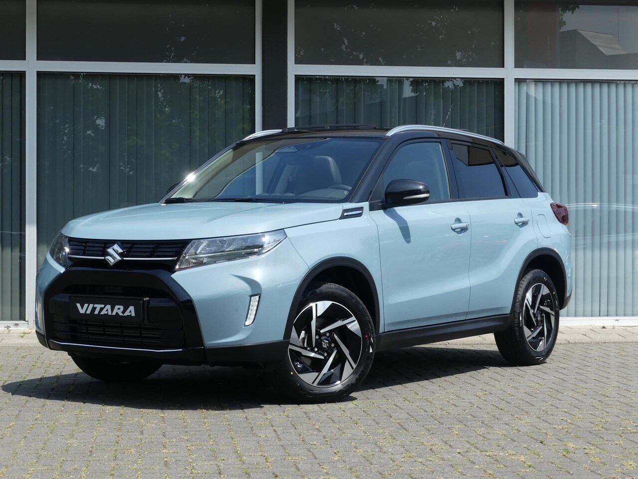 Suzuki Vitara - 1.4 Boosterjet Style Smart Hybrid 6 jaar garantie! Panoramadak, Nieuwe Auto uit voorraad l - AutoWereld.nl
