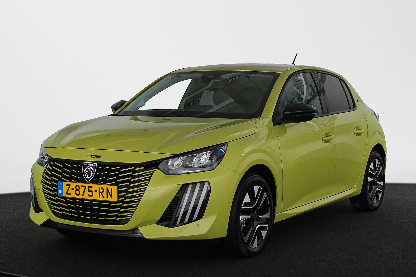 Peugeot e-208 - EV Style 50 kWh Stoelverwarming / Navigatie / Keyless / SOH 98% - AutoWereld.nl