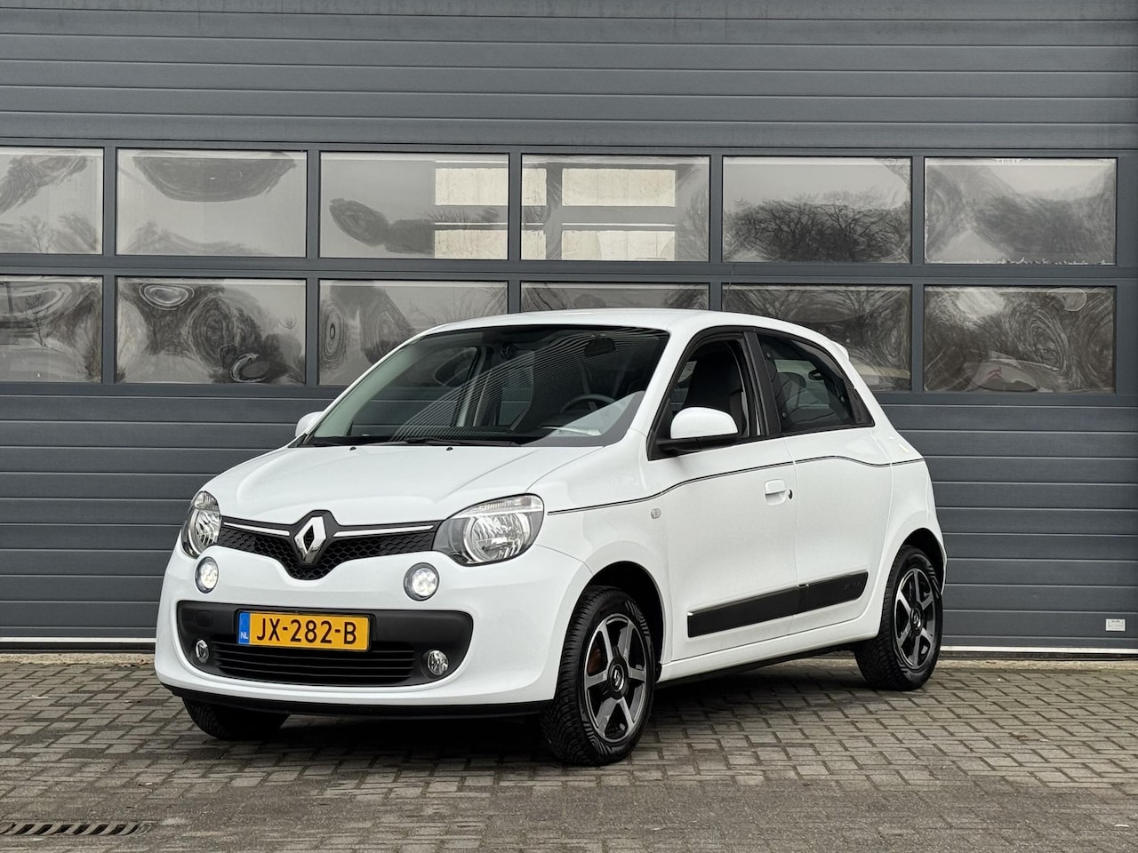 Renault Twingo - 1.0 SCE DYNAMIQUE I AIRCONDITIONING I CRUISE CONTROL I NAVIGATIE I R-LINK I PARKEERSENSORE - AutoWereld.nl