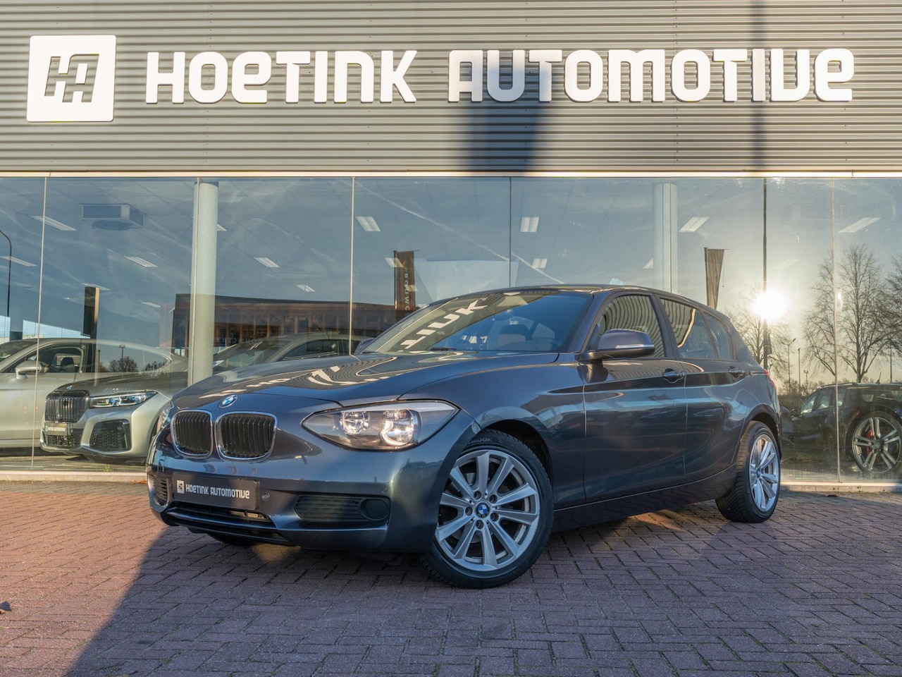 BMW 1-serie - 116i High Executive | Apple Car Play | Stoelverwarming - AutoWereld.nl