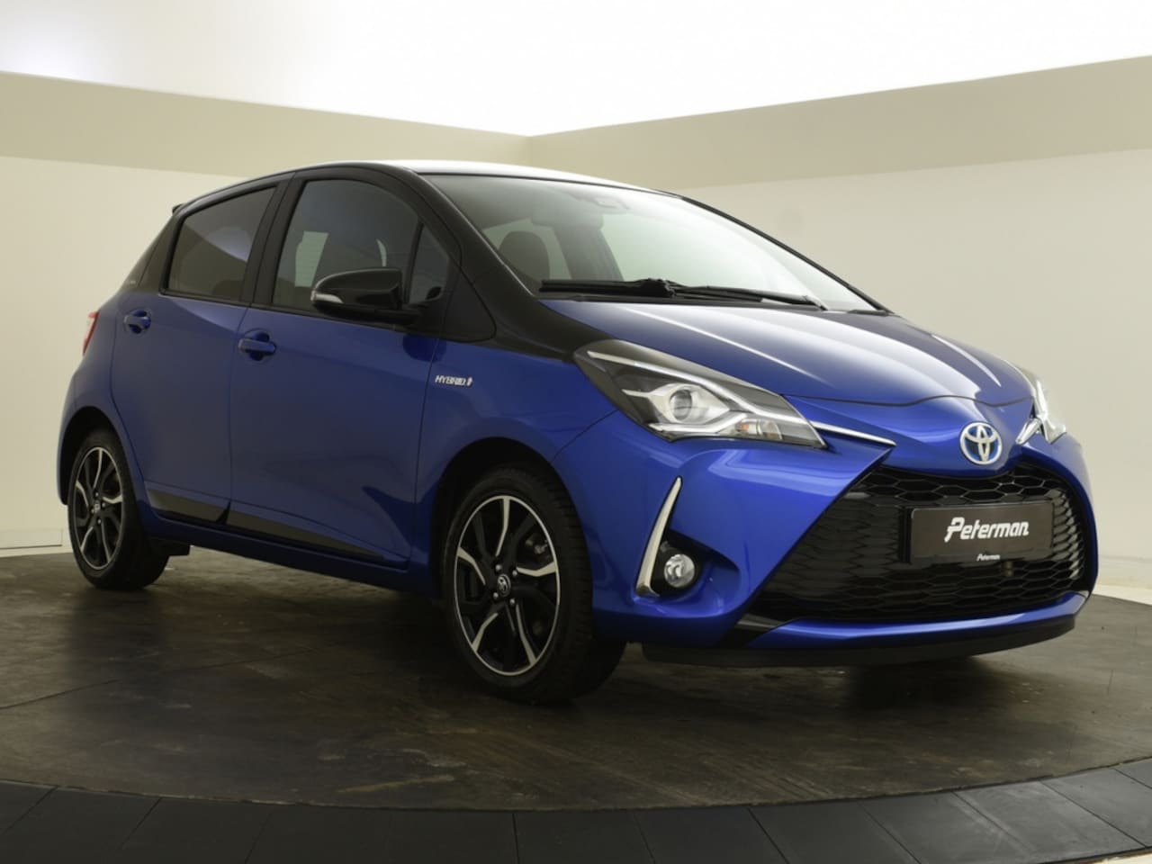 Toyota Yaris - 1.5 Hybrid Bi-Tone | Navigatie | Keyless | Stoelverwarming - AutoWereld.nl