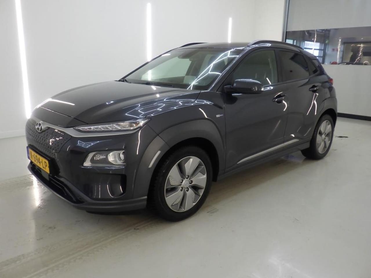 Hyundai Kona Electric - EV PREMIUM 64 KWH I 3-FASE I 100% SOH I STOELVERWARMING I ALL-IN PRIJS - AutoWereld.nl