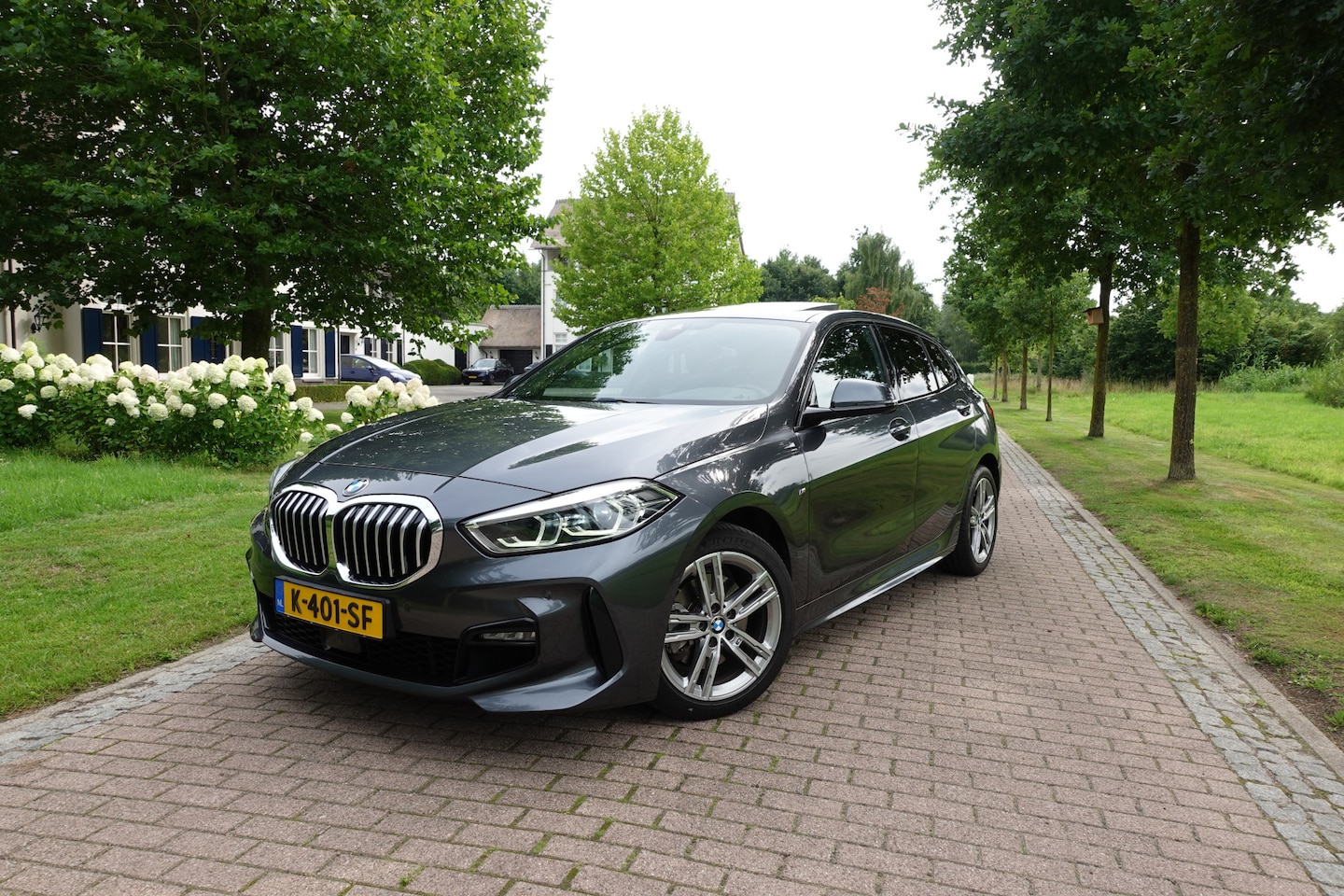 BMW 1-serie - 118i High Executive M-Sport | Panodak | Stoelverw. | LED | DAB | Camera | BTW | - AutoWereld.nl