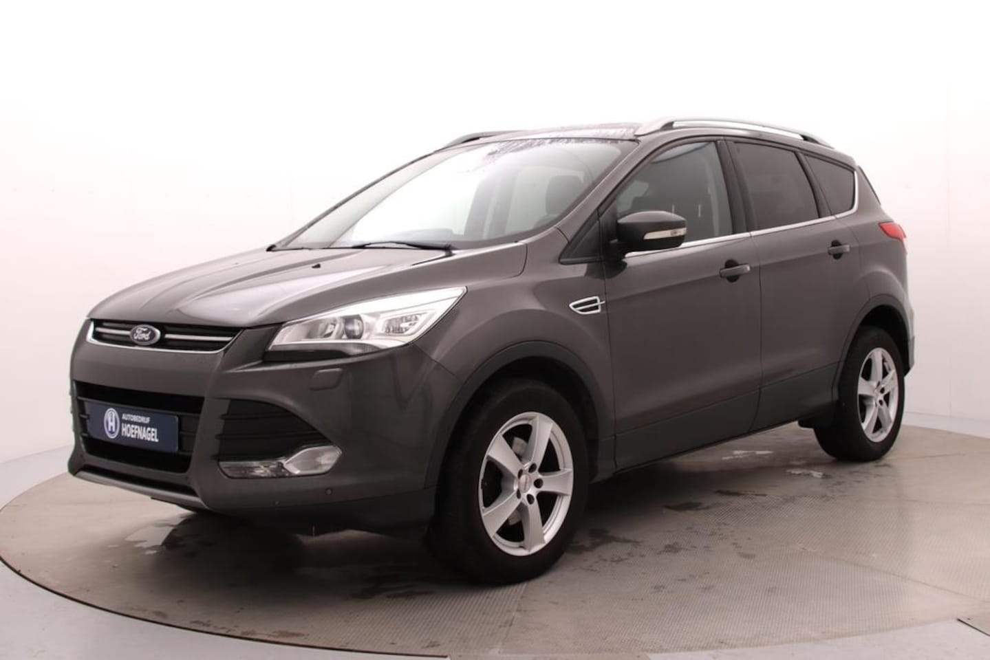 Ford Kuga - 1.5 Titanium | Trekhaak | Navigatie | Stoelverwarming | Camera | Cruise Control - AutoWereld.nl