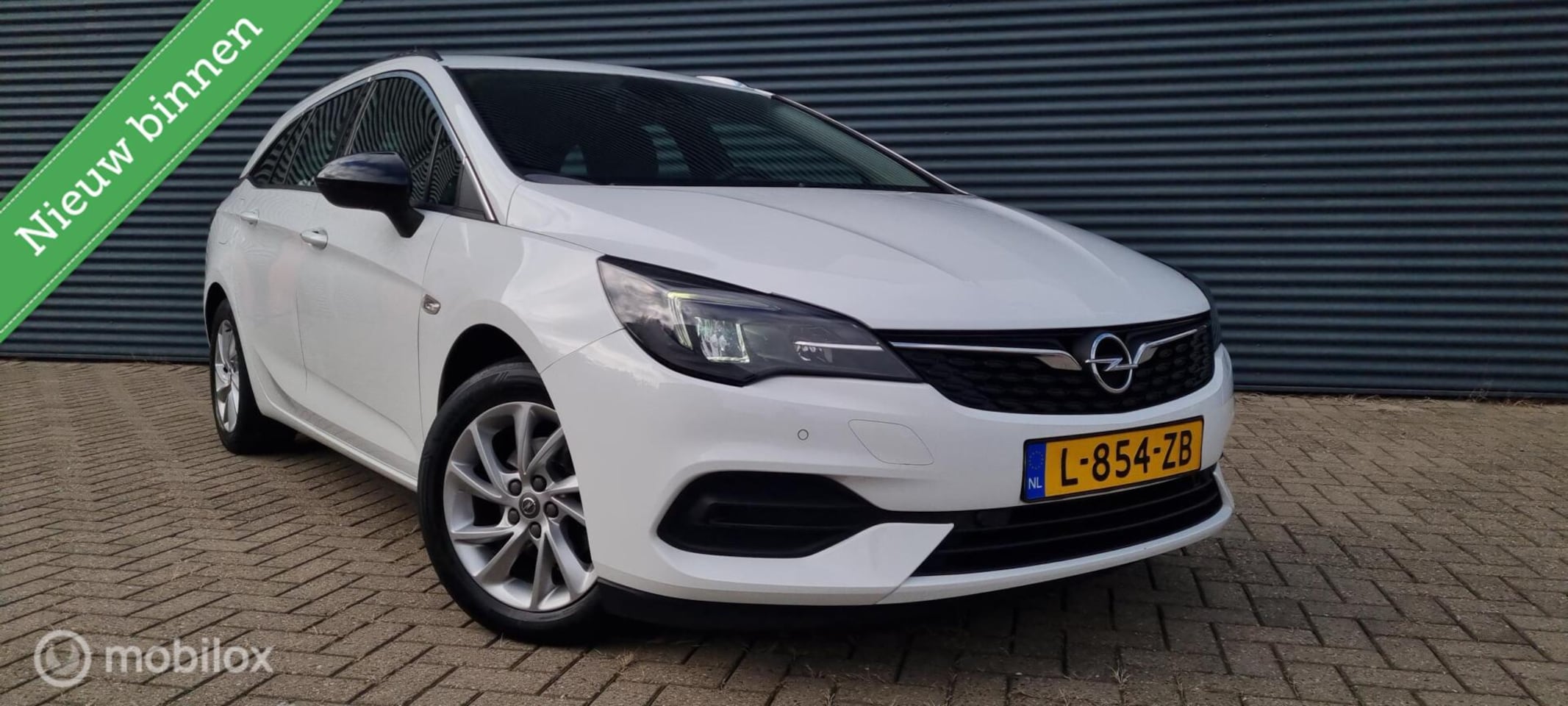 Opel Astra Sports Tourer - 1.2 Business Elegance 1.2 Business Elegance - AutoWereld.nl