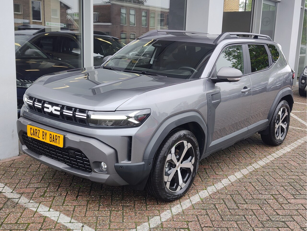 Dacia Duster - 1.6 HYBRID 140 JOURNEY AUTOMAAT Dodehoeksensoren | 360 Camera | Keyless - AutoWereld.nl