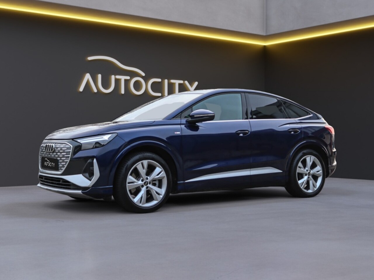 Audi Q4 Sportback e-tron - 40 e-tron 77kWh S Line 3x l Leder l Memory l HUD - AutoWereld.nl