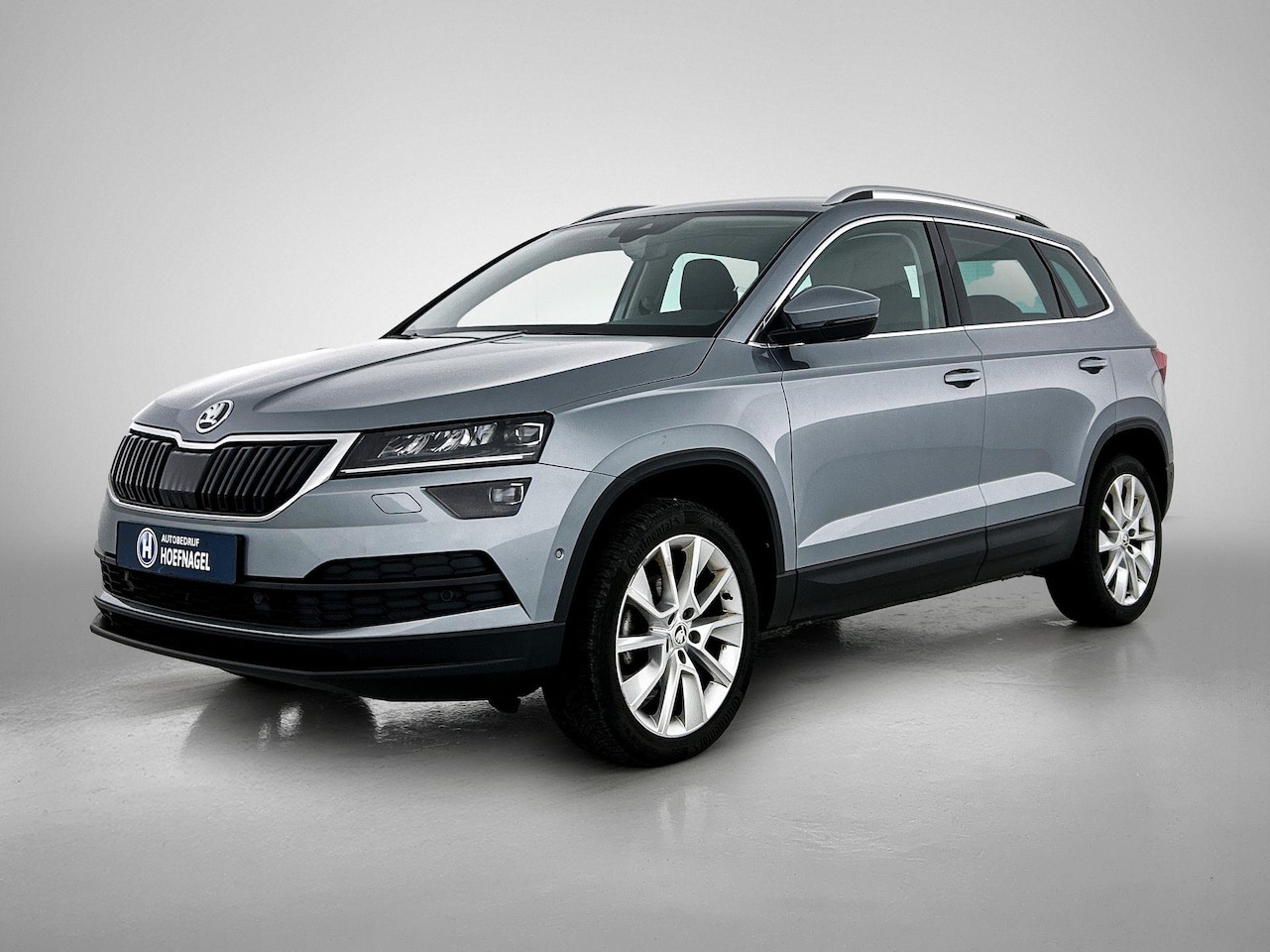 Skoda Karoq - 1.5 TSI ACT Sportline Business | Automaat | Adaptive cruise control | Stoelverwarming | Ca - AutoWereld.nl