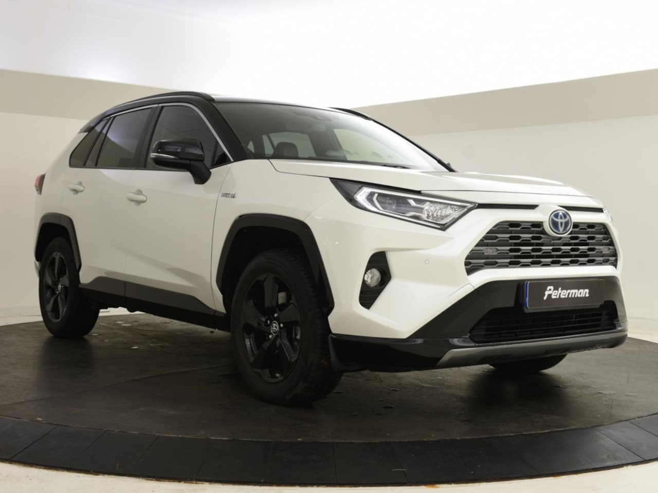 Toyota RAV4 - 2.5 Hybrid Bi-Tone | JBL | Stoelverwarming | Parkeersensoren V+A - AutoWereld.nl