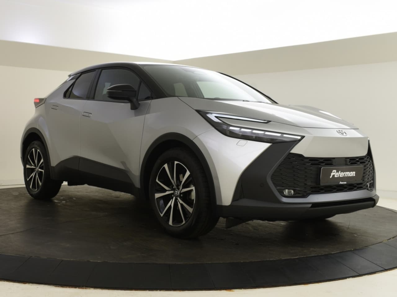 Toyota C-HR - 1.8 Hybrid 140 Style Bi Tone | Elektrische A. Klep | Blindspot - AutoWereld.nl