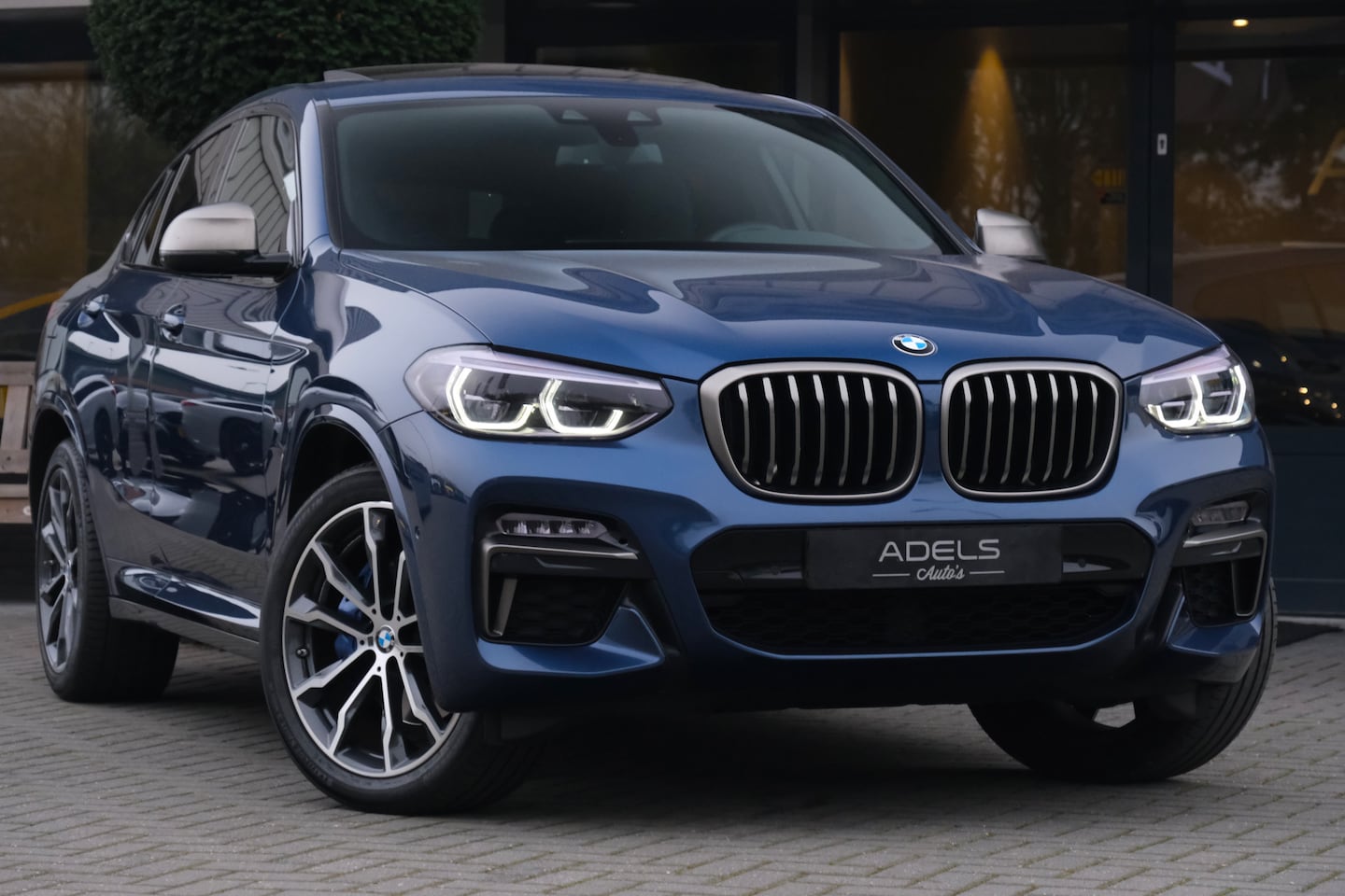 BMW X4 - M40i High Executive M Sport Panodak Harman Kardon Trekhaak Adaptive Led Adaptive Onderstel - AutoWereld.nl