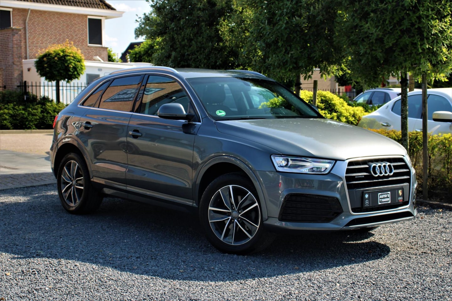 Audi Q3 - 2.0 TFSI Quattro Sport line | S-tronic | Trekhaak | LEER | - AutoWereld.nl