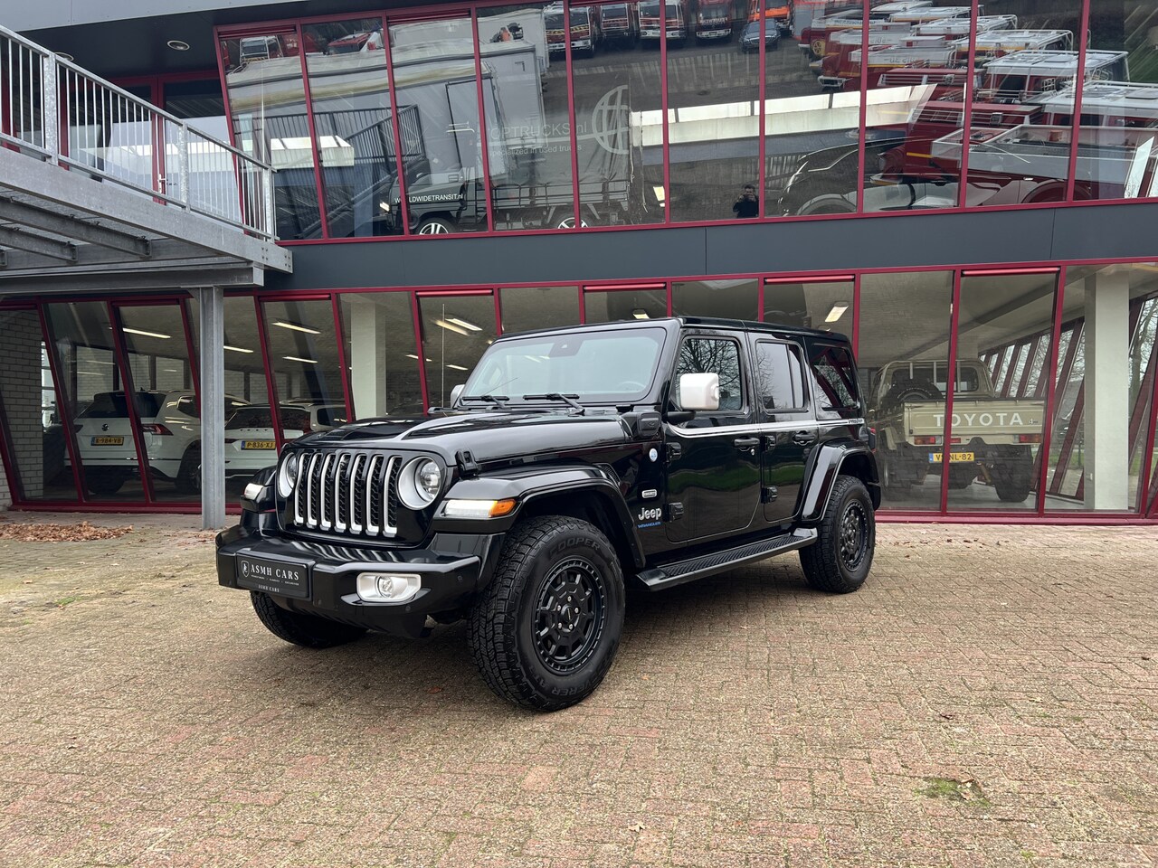 Jeep Wrangler Unlimited - 4xe 380 Sahara | Irmscher | Cross | Camera voor | - AutoWereld.nl