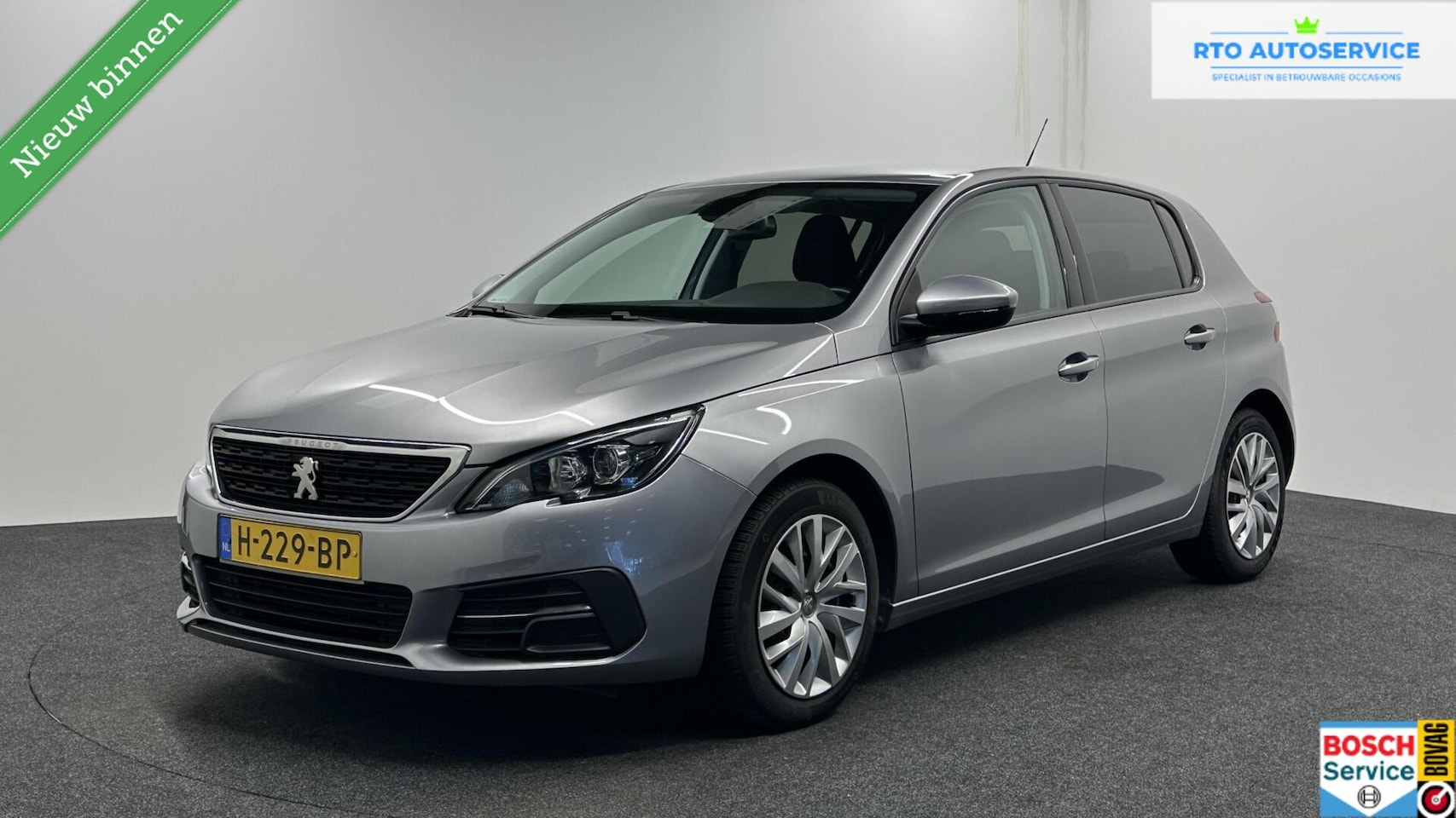 Peugeot 308 - 1.2 PureTech Blue Lease CRUISE NAVI CAMERA CARPLAY - AutoWereld.nl