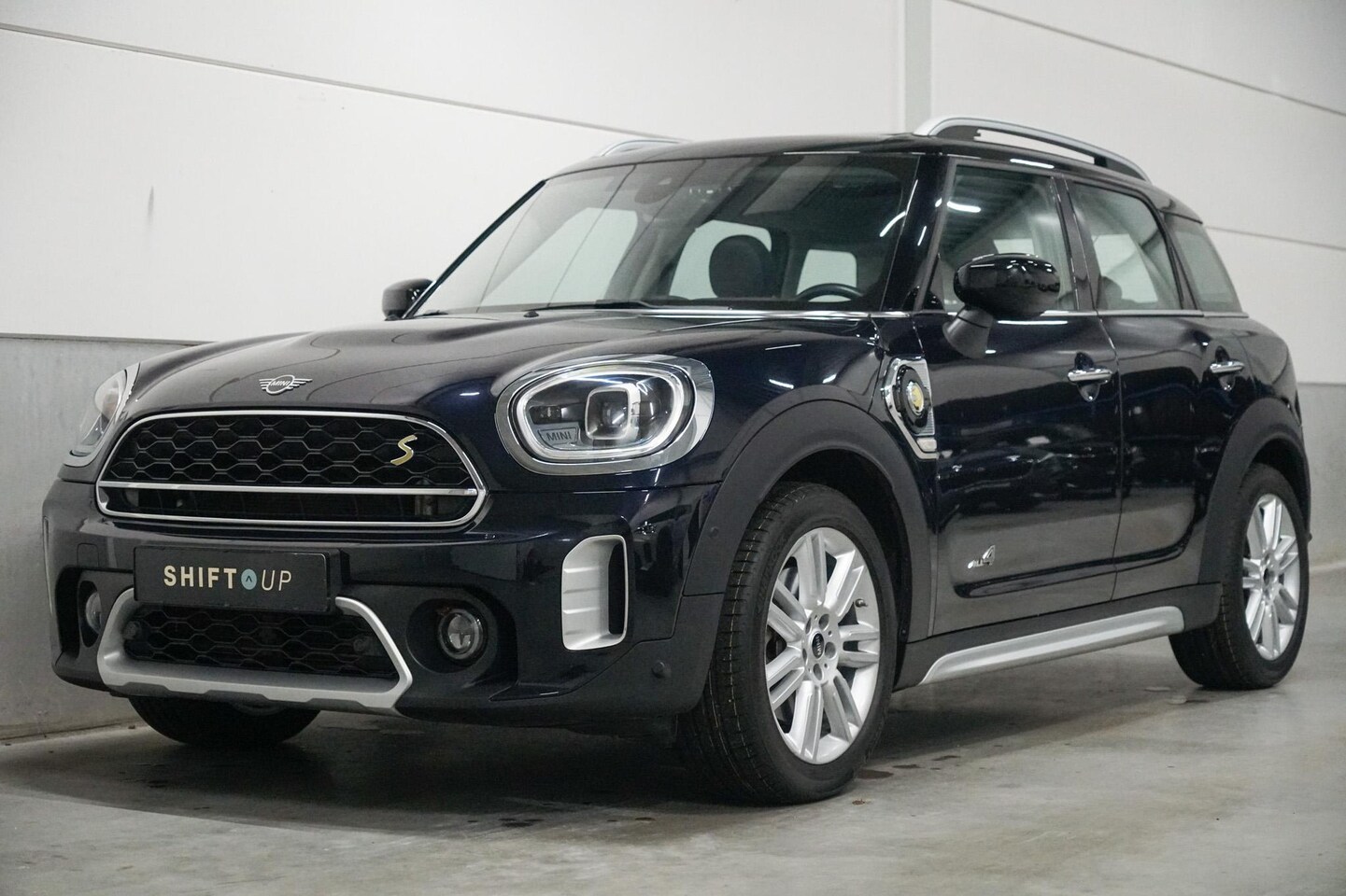 MINI Countryman - Mini 2.0 Cooper S E ALL4 Panoramadak | Head Up | Adapt. Cruise Control - AutoWereld.nl
