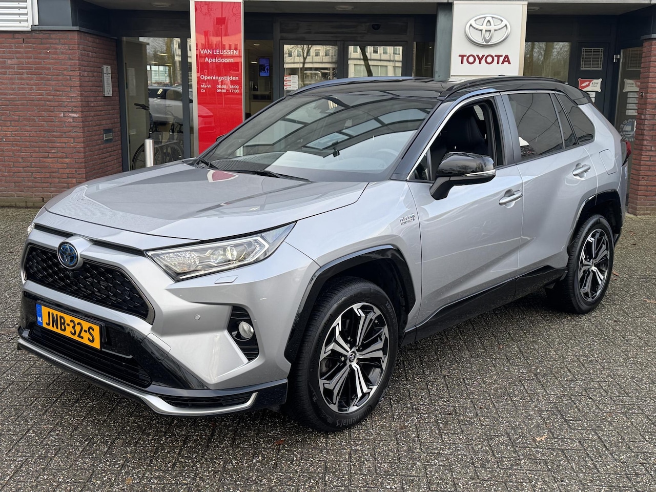 Toyota RAV4 - 2.5 Plug-in Hybrid AWD BI-TONE PLUS TREKHAAK 1500KG TREKGEW LEER STOELKOELING/VERWARMING P - AutoWereld.nl